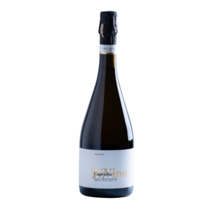 Botella de vino espumoso etiquetada como "Capricho Di.Vino" Chardonnay Brut Nature, producido en la región de la Manchuela.